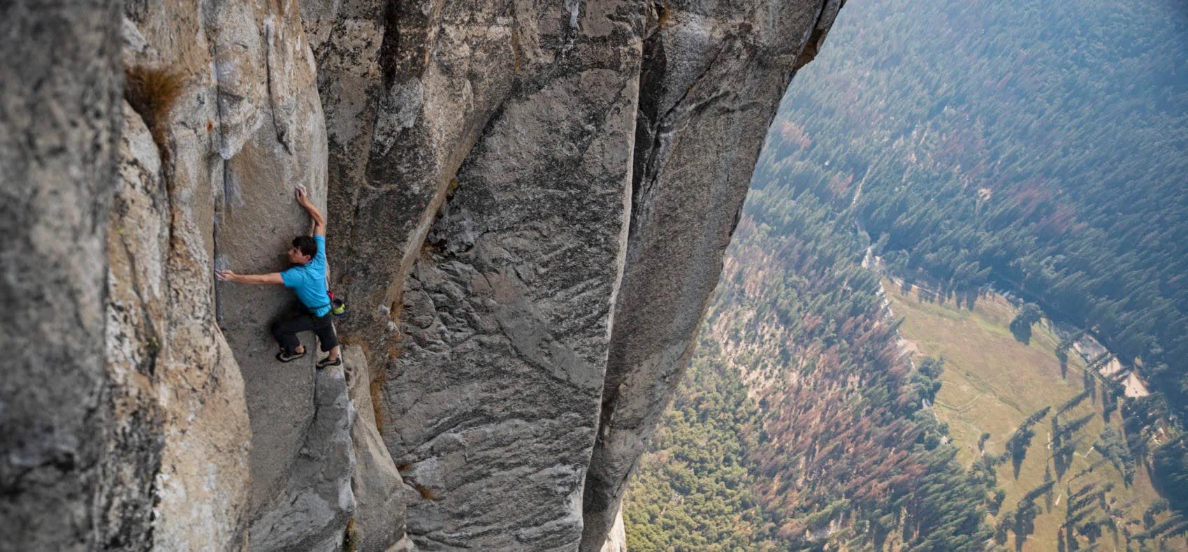 Mountain climber on a cliff.